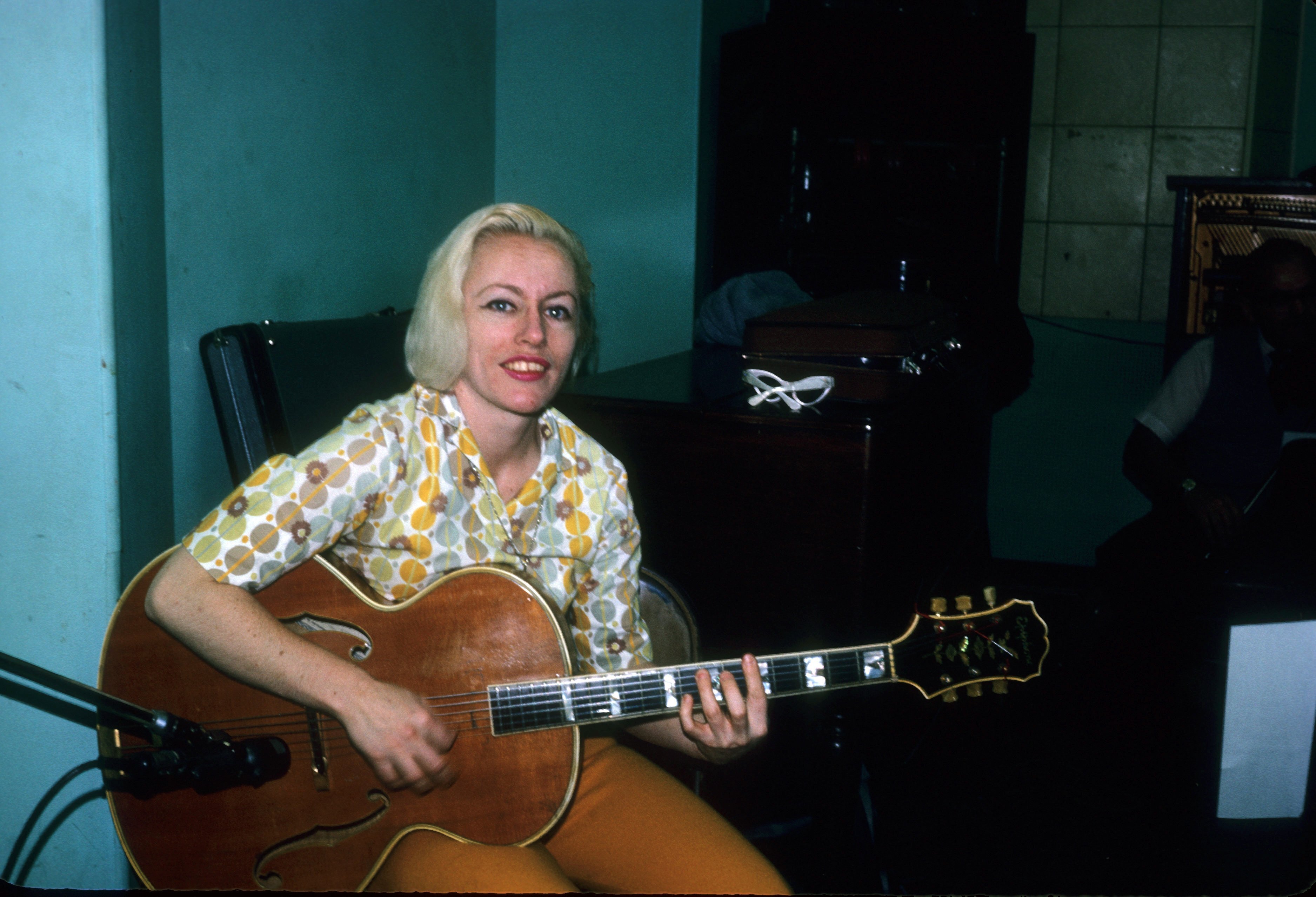 Bassist Carol Kaye plays an Epiphone hollowbody electric guitar in April 1966 in Los Angeles, California.